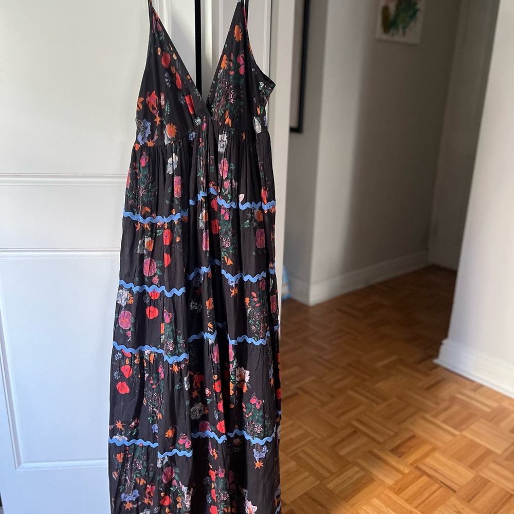 Never worn Ro’sGarden maxi dress. Beautiful black with floral pattern.